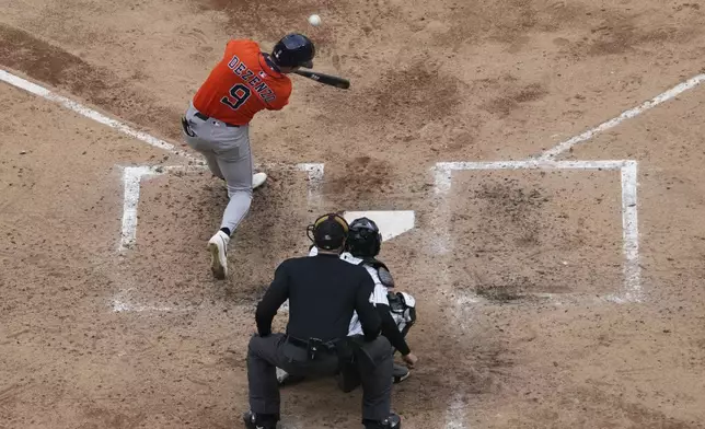 Houston Astros' Zach Dezenzo (9) hits a two-run home run during the fifth inning of a baseball game against the Chicago White Sox in Chicago, Sunday, May 4, 2025. (AP Photo/Nam Y. Huh)