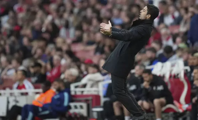 Arsenal's manager Mikel Arteta reacts during the English Premier League soccer match between Arsenal and Bournemouth at Emirates stadium in London, Saturday, May 3, 2025. (AP Photo/Kin Cheung)