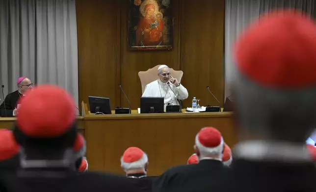 Pope Leo XIV meets the College of Cardinals in the New Synod Hall at the Vatican, Saturday, May 10, 2025. (Vatican Media via AP)