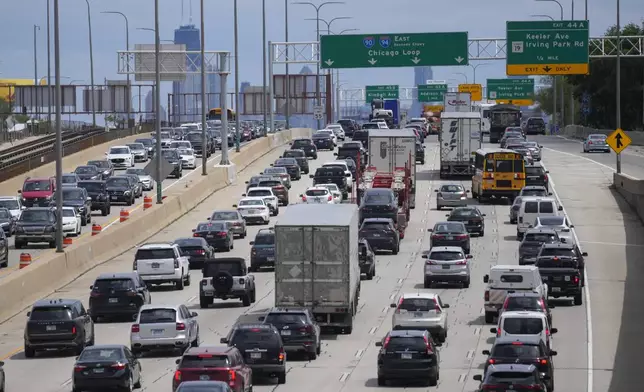 Vehicles travel on Interstate 90 and Interstate 94 ahead of Memorial Day weekend Thursday, May 22, 2025, in Chicago. (AP Photo/Erin Hooley)