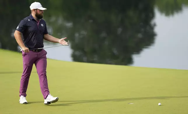 Tyrrell Hatton, of England, reacts after missing a putt on the 14th hole during the second round of the PGA Championship golf tournament at the Quail Hollow Club, Friday, May 16, 2025, in Charlotte, N.C. (AP Photo/George Walker IV)