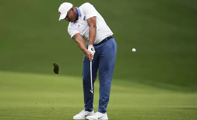 Jhonattan Vegas, of Venezuela, hits from the fairway on the 18th hole during the second round of the PGA Championship golf tournament at the Quail Hollow Club, Friday, May 16, 2025, in Charlotte, N.C. (AP Photo/George Walker IV)