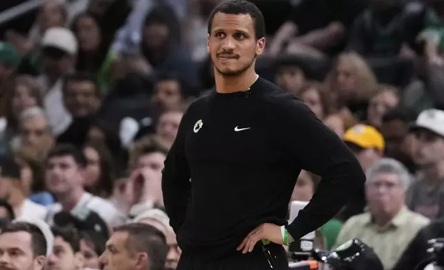Boston Celtics head coach Joe Mazzulla watches his players during the first half in game 5 of a first-round NBA playoff basketball series against the Boston Celtics, Tuesday, April 29, 2025, in Boston. (AP Photo/Charles Krupa)