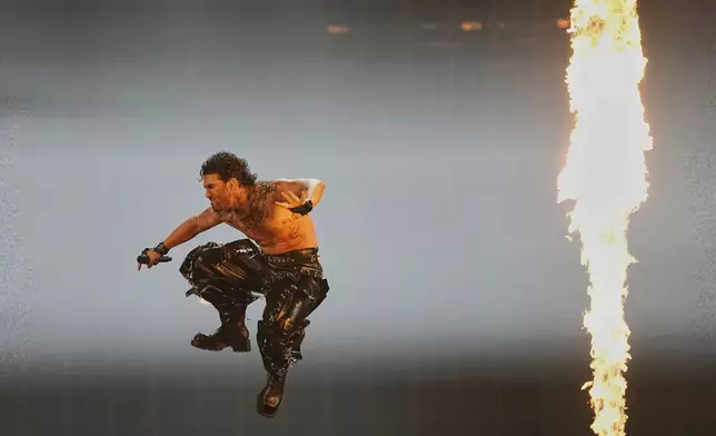 PARG from Armenia performs the song "SURVIVOR" during the dress rehearsal for the Grand Final of the 69th Eurovision Song Contest, in Basel, Switzerland, Friday, May 16 2025. (AP Photo/Martin Meissner)