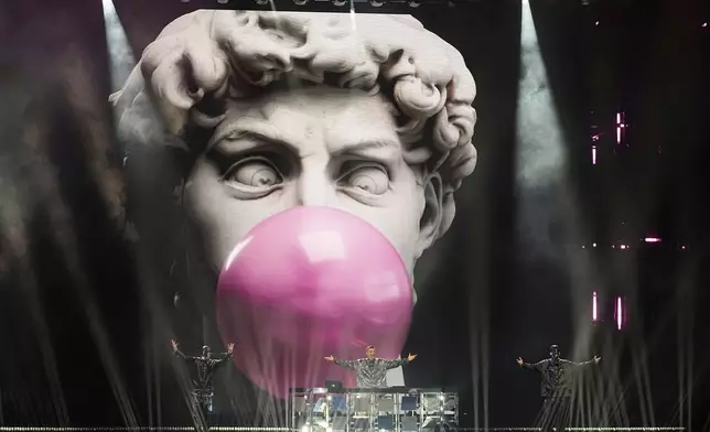 Gabry Ponte from San Marino performs the song "Tutta L'Italia" during the dress rehearsal for the Grand Final of the 69th Eurovision Song Contest, in Basel, Switzerland, Friday, May 16 2025. (AP Photo/Martin Meissner)