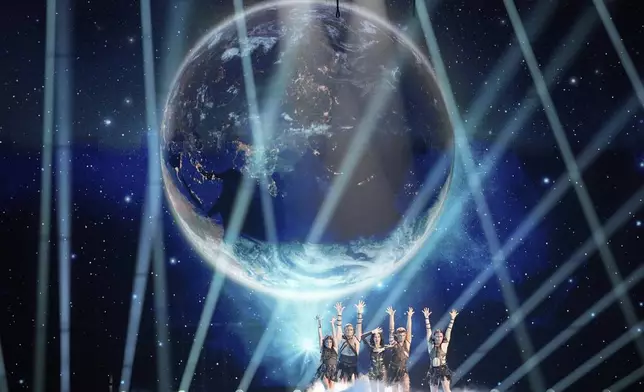 Justyna Steczkowska from Poland performs the song "GAJA" during the dress rehearsal for the Grand Final of the 69th Eurovision Song Contest, in Basel, Switzerland, Friday, May 16 2025. (AP Photo/Martin Meissner)