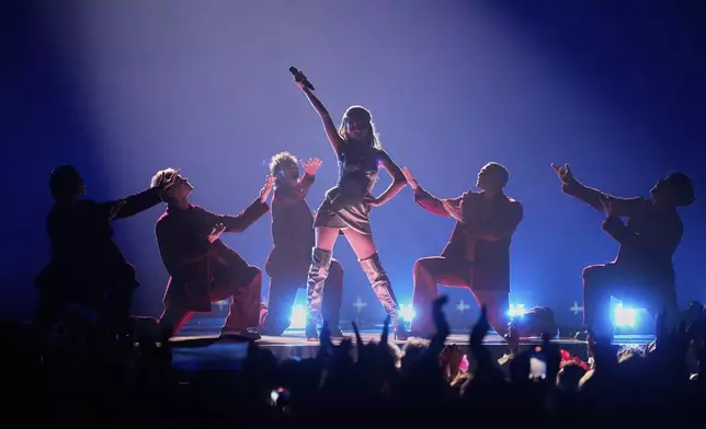 Laura Thorn from Luxembourg performs the song "La Poupee Monte Le Son" during the Grand Final of the 69th Eurovision Song Contest, in Basel, Switzerland, Saturday, May 17, 2025. (AP Photo/Martin Meissner)