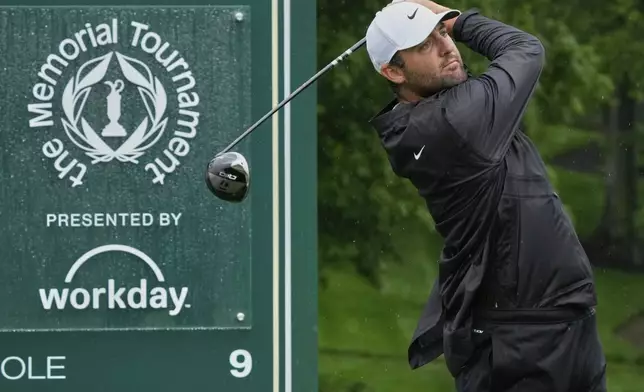 Scottie Scheffler hits from the ninth tee during the second round of the Memorial golf tournament, Friday, May 30, 2025, in Dublin, Ohio. (AP Photo/Sue Ogrocki)