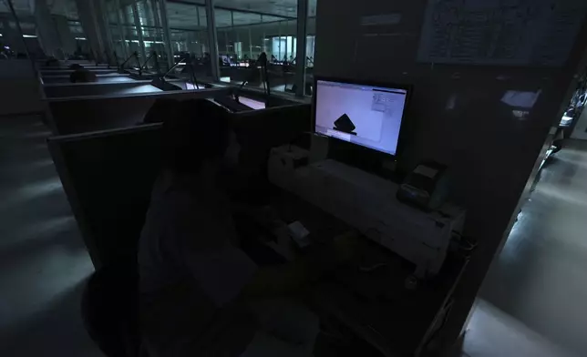 A computer screen shows an representative image of a diamond in the designing area of Shree Ramkrishna Exports in Surat, India, on April 14, 2025. (AP Photo/Ajit Solanki)