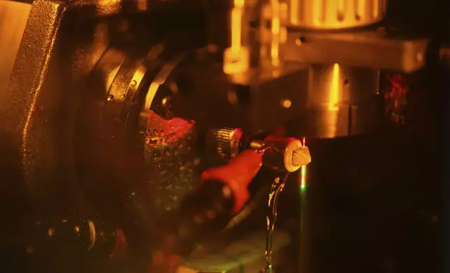 A diamond is cut at Shree Ramkrishna Exports in Surat, India, on April 14, 2025. (AP Photo/Ajit Solanki)