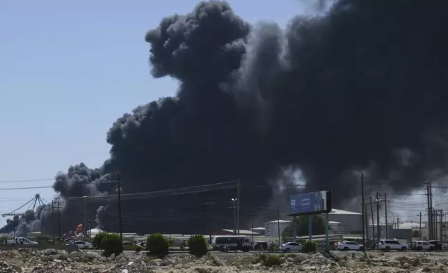 Smoke billows after drone strikes by the paramilitary Rapid Support Forces (RSF) targeted the northern port in the Red Sea city of Port Sudan, Sudan, Tuesday, May 6, 2025. (AP Photo)