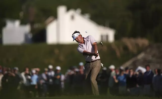 Keith Mitchell hits on the 18th hole during the third round of the Truist Championship golf tournament at the Philadelphia Cricket Club, Saturday, May 10, 2025, in Flourtown. (AP Photo/Matt Rourke)