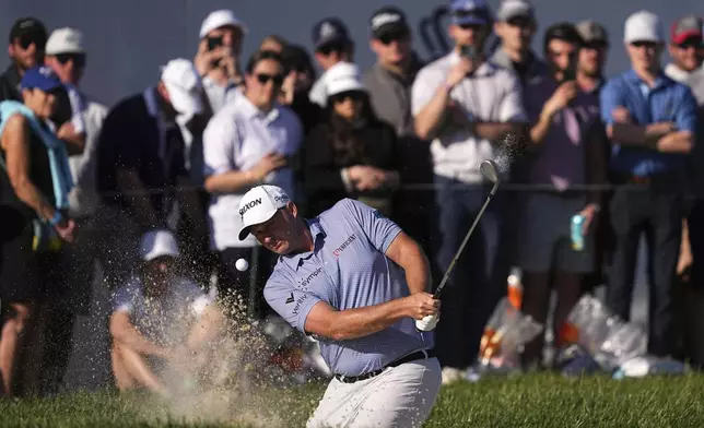 Sepp Straka, of Austria, hits on the 18th hole during the third round of the Truist Championship golf tournament at the Philadelphia Cricket Club, Saturday, May 10, 2025, in Flourtown. (AP Photo/Matt Rourke)