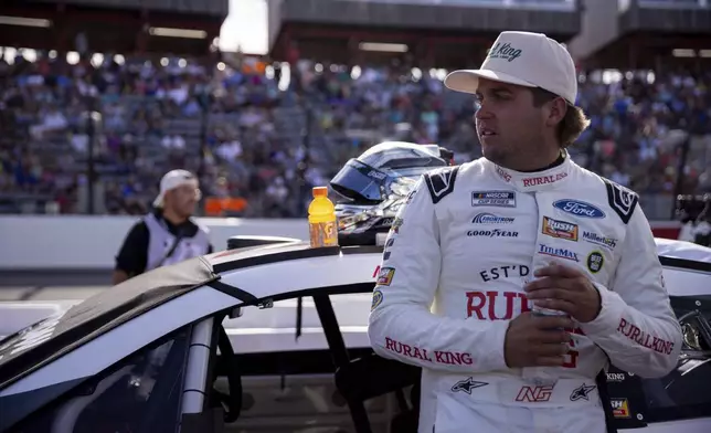 Noah Gragson waits to drive in the NASCAR All-Star Open auto race Sunday, May 18, 2025, in North Wilkesboro, N.C. (AP Photo/Scott Kinser)