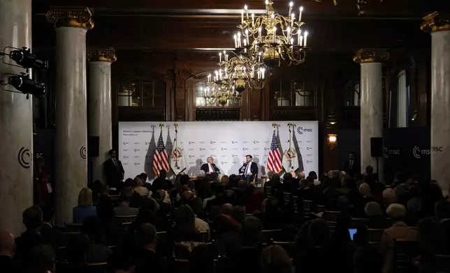 Vice President JD Vance, right, speaks with Wolfgang Ischinger, left, at the Munich Leaders Meeting, Wednesday, May 7, 2025, in Washington. (AP Photo/Julia Demaree Nikhinson)