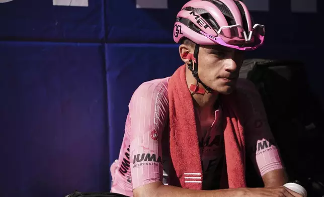 Mexico's Isaac Del Toro Romero of Uae Team Emirates Xrg, wearing the leader pink jersey, looks on after finishing the stage 16 of the Giro d'Italia from Piazzola sul Brenta to San Valentino, Italy, Tuesday, May 27, 2025. (Marco Alpozzi/LaPresse via AP)