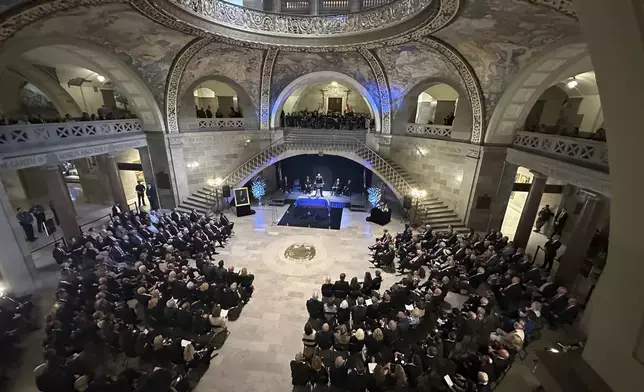 Hundreds of people gather in the Missouri Capitol Rotunda for the memorial service of former Missouri Gov. and U.S. Sen. Christoper Kit Bond on Tuesday, May 20, 2025, in Jefferson City, Mo. (AP Photo/David A. Lieb)