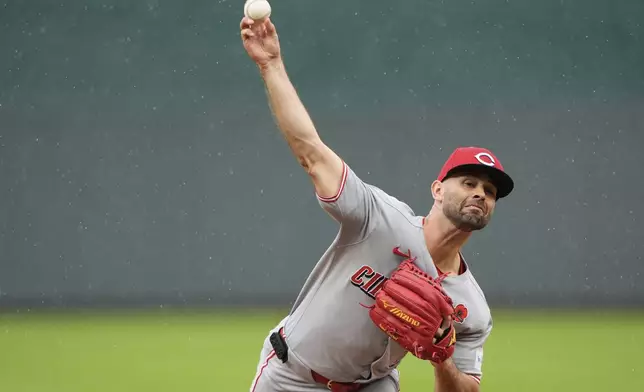 Cincinnati Reds starting pitcher Nick Martinez throws during the first inning of a baseball game against the Kansas City Royals, Monday, May 26, 2025, in Kansas City, Mo. (AP Photo/Charlie Riedel)