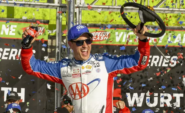 Joey Logano celebrates after winning a NASCAR Cup Series auto race at Texas Motor Speedway in Fort Worth, Texas, Sunday, May 4, 2025. (AP Photo/Randy Holt)