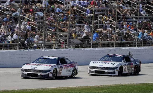 Austin Cindric (2) leads the field during a NASCAR Cup Series auto race at Texas Motor Speedway in Fort Worth, Texas, Sunday, May 4, 2025. (AP Photo/Larry Papke)