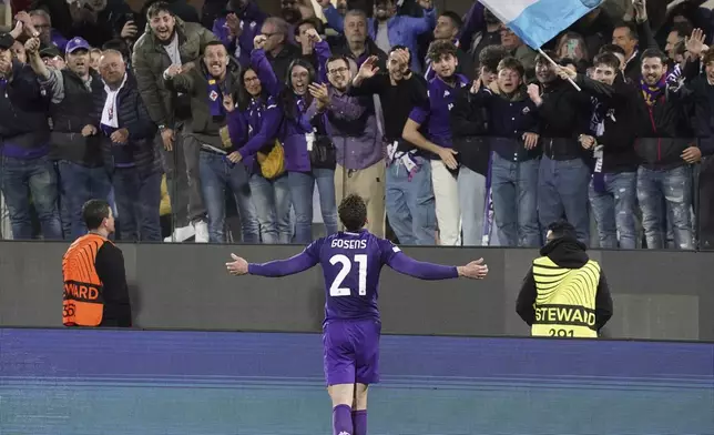Fiorentina's Robin Gosens celebrates after scoring during the UEFA Conference League second leg semifinal soccer match between Fiorentina and Real Betis at Artemio Franchi stadium in Florence, Italy, Thursday, May 8, 2025. (Marco Bucco/LaPresse via AP)