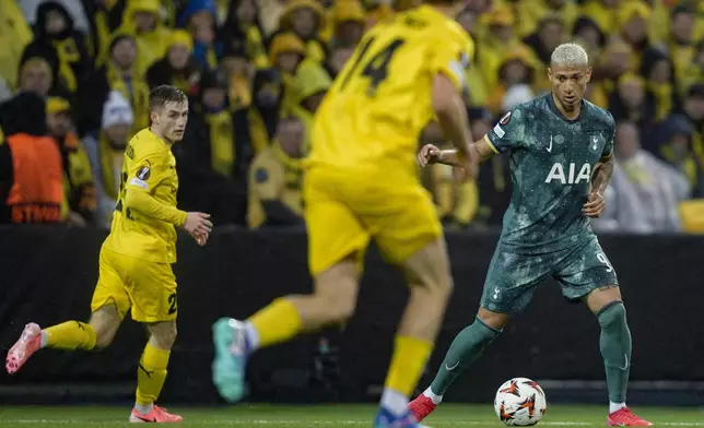 Tottenham Hotspur's Richarlison, right, in action during the Europa League semifinal soccer match between Bodø/Glimt and Tottenham Hotspur at Aspmyra Stadium, Bodo, Norway, Thursday May 8, 2025. (Stian Lysberg Solum/NTB via AP)
