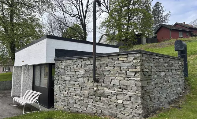 The above-ground entrance to a public shelter, which can fit around 450 people in case of crisis or war, is seen in Kongsberg, Norway Thursday, May 8, 2025. (AP Photo/Emma Burrows)