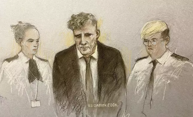 This court artist sketch by Elizabeth Cook shows Paul Doyle, 53, appearing at Liverpool Magistrates' Court, where he was remanded in custody charged with seven offenses following the incident in Liverpool city center on Monday, May 26, 2025. (Elizabeth Cook/PA via AP)