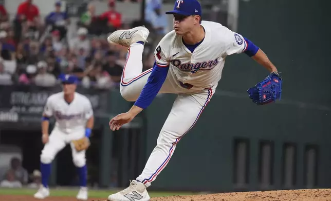 Texas Rangers starting pitcher Jack Leiter delivers a pitch during the fifth inning of a baseball game against the Colorado Rockies, Tuesday, May 13, 2025, in Arlington, Texas. (AP Photo/LM Otero)
