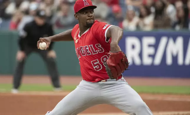 Los Angeles Angels starting pitcher Jose Soriano delivers against the Cleveland Guardians during the first inning of a baseball game, Friday, May 30, 2025, in Cleveland. (AP Photo/Phil Long)