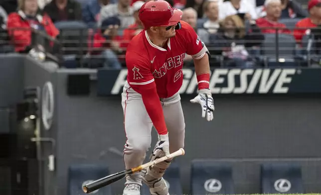 Los Angeles Angels' Mike Trout watches his flyout during the first inning of a baseball game against the Cleveland Guardians, Friday, May 30, 2025, in Cleveland. (AP Photo/Phil Long)