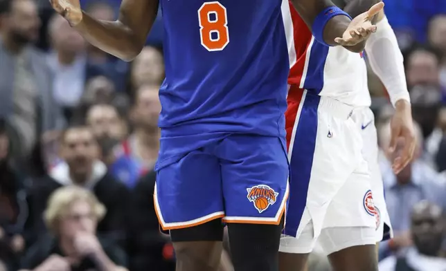 New York Knicks forward OG Anunoby (8) reacts after being whistled for a foul against the Detroit Pistons during the first half of Game 6 of an NBA basketball first-round playoff series Thursday, May 1, 2025, in Detroit. (AP Photo/Duane Burleson)