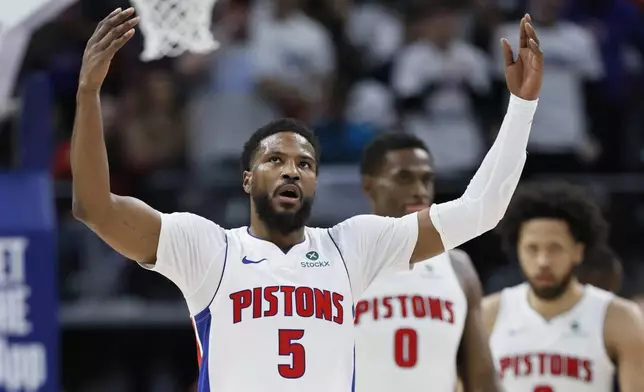 Detroit Pistons guard Malik Beasley (5) celebrates after scoring against the New York Knicks during the first half of Game 6 of an NBA basketball first-round playoff series Thursday, May 1, 2025, in Detroit. (AP Photo/Duane Burleson)