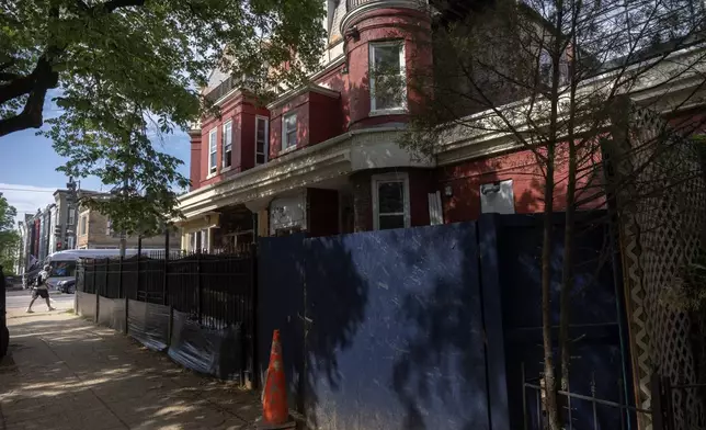 A building, currently vacant and under heavy renovation, at an address associated with a contribution to President Donald Trump, is photographed May 2, 2025, in Washington. (AP Photo/Mark Schiefelbein)