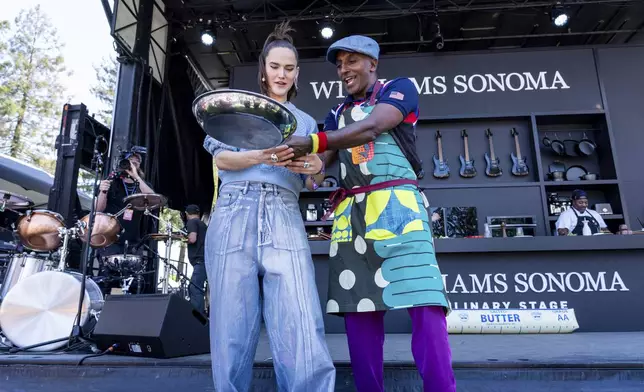 Sophie Hawley-Weld, left, and Marcus Samuelsson are seen at the Williams Sonoma Culinary Stage during the 2025 BottleRock Napa Valley on Friday, May 23, 2025, at Napa Valley Expo in Napa, Calif. (Photo by Amy Harris/Invision/AP)