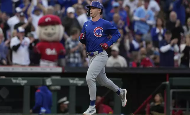 Chicago Cubs' Pete Crow-Armstrong rounds the bases after hitting a two-run home run in the fourth inning during a baseball game against the Chicago Cubs, Friday, May 23, 2025, in Cincinnati. (AP Photo/Carolyn Kaster)