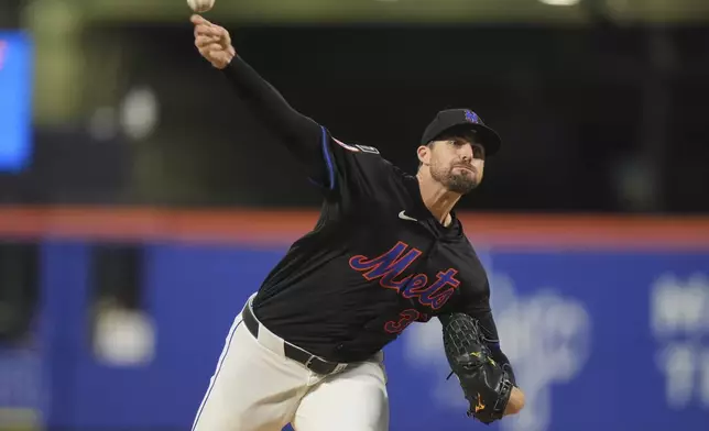 New York Mets' Clay Holmes pitches during the second inning of a baseball game against the Chicago Cubs Friday, May 9, 2025, in New York. (AP Photo/Frank Franklin II)