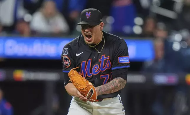New York Mets pitcher José Buttó celebrates after a baseball game against the Chicago Cubs Friday, May 9, 2025, in New York. (AP Photo/Frank Franklin II)