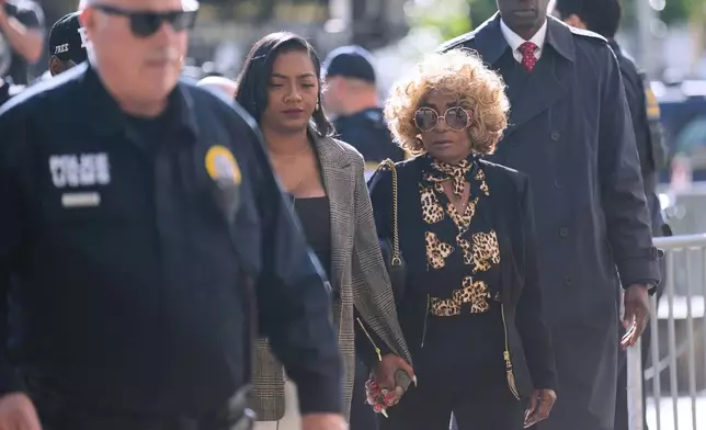 Janice Combs, mother of Sean "Diddy" Combs, second from right, arrives to the courthouse in New York, Monday, May 12, 2025. (AP Photo/Seth Wenig)