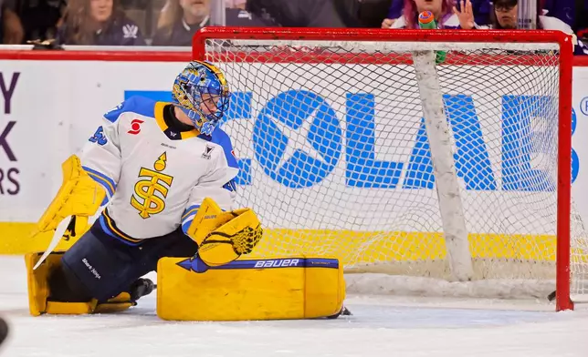 Toronto Sceptres goaltender Kristen Campbell watches the puck go past her for a goal by Minnesota Frost's Lee Stecklein in the first period of a PWHL hockey playoff game Sunday, May 11, 2025, in St. Paul, Minn. (AP Photo/Bruce Kluckhohn)