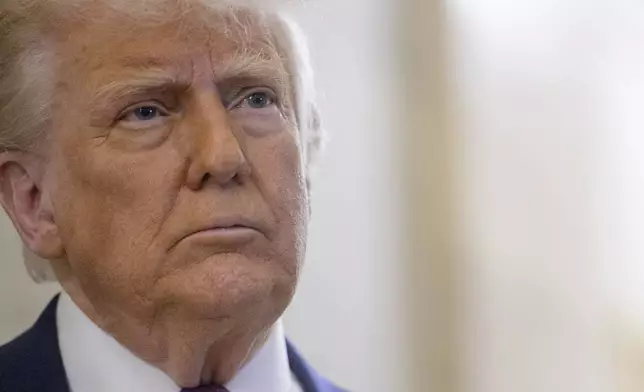 President Donald Trump speaks to reporters as he arrives for a meeting with the House Republican Conference at the Capitol, Tuesday, May 20, 2025, in Washington. (AP Photo/Rod Lamkey, Jr.)