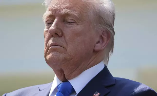 President Donald Trump listens during a National Day of Prayer event in the Rose Garden of the White House, Thursday, May 1, 2025, in Washington. (AP Photo/Evan Vucci)