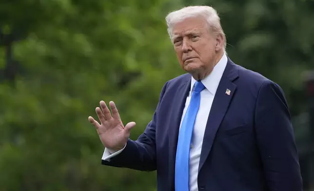 President Donald Trump waves as he walks from the Oval Office to depart on Marine One from the South Lawn of the White House, Thursday, May 1, 2025, in Washington. (AP Photo/Alex Brandon)