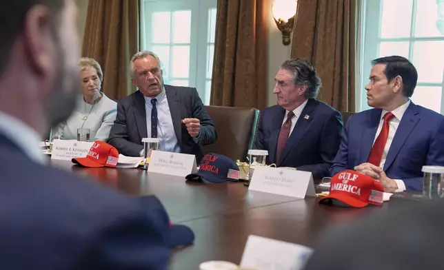 Secretary of Health and Human Services Robert F. Kennedy, Jr., speaks during a cabinet meeting at the White House, Wednesday, April 30, 2025, in Washington, as from left, Vice President JD Vance, Secretary of Education Linda McMahon, Kennedy, Secretary of Interior Doug Burgum and Secretary of State Marco Rubio, look on. (AP Photo/Evan Vucci)