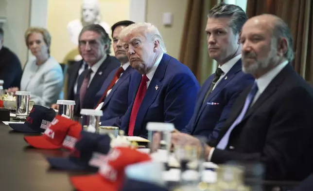 President Donald Trump listens during a cabinet meeting at the White House, Wednesday, April 30, 2025, in Washington. (AP Photo/Evan Vucci)