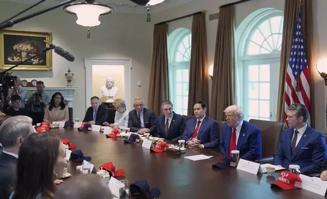 President Donald Trump, second right, speaks during a cabinet meeting at the White House, Wednesday, April 30, 2025, in Washington. (AP Photo/Evan Vucci)
