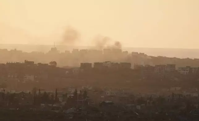 Smoke rises following an Israeli army bombardment in Gaza Strip, seen from southern Israel, Tuesday, May 20, 2025. (AP Photo/Maya Alleruzzo)
