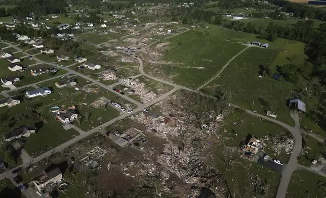 A path of destroyed homes is seen, Sunday, May 18, 2025, in London, Ky., after a severe storm passed through the area. (AP Photo/Carolyn Kaster)