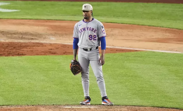 New York Mets pitcher Génesis Cabrera (92) reacts after New York Yankees' Cody Bellinger hit a grand slam during the eighth inning of a baseball game Sunday, May 18, 2025, in New York. (AP Photo/Frank Franklin II)