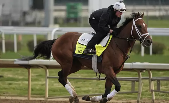 Kentucky Derby entrant Journalism works out at Churchill Downs Thursday, May 1, 2025, in Louisville, Ky. (AP Photo/Charlie Riedel)